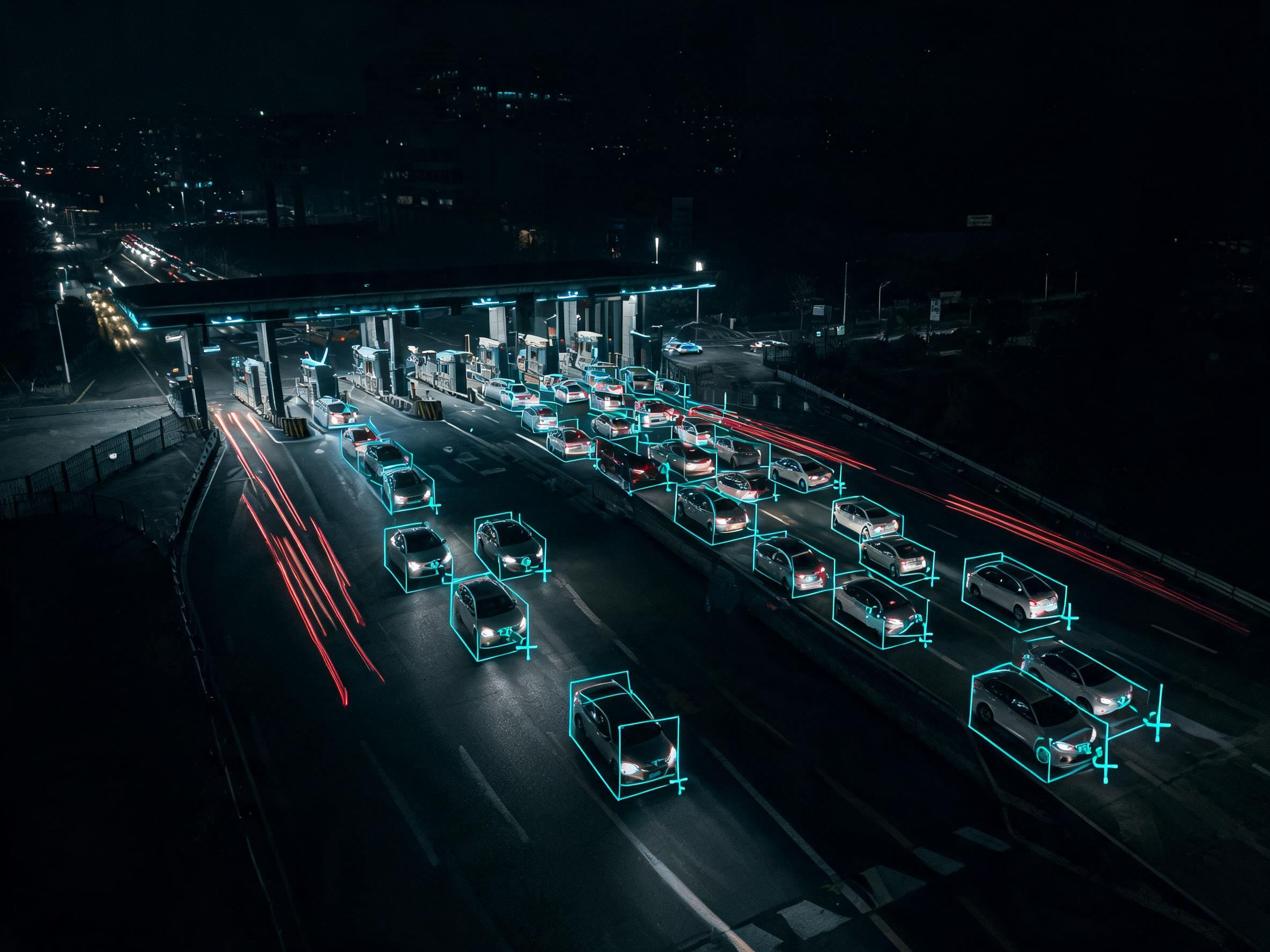 Traffic junction at night with vehicle detection overlays